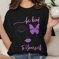 black t shirt with a butterfly design and a "be kind to yourself" message